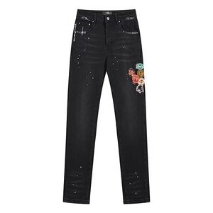 AMIRI Black Skinny Jeans with Colorful Patches